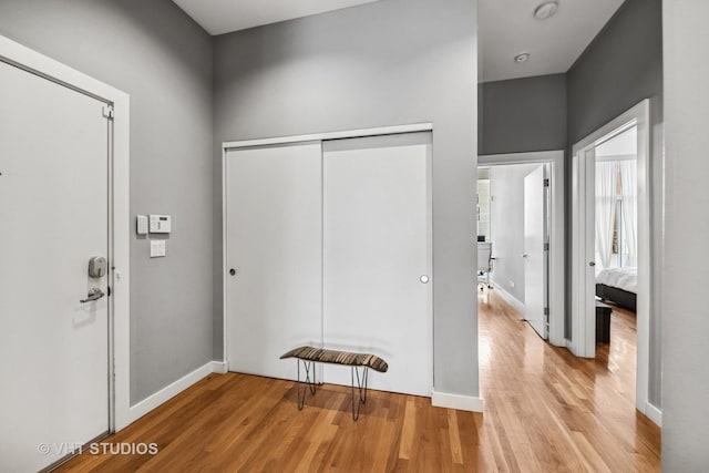 1711 W Division St Unit 303, Chicago, IL 60622 - entrance foyer featuring light wood-style flooring and baseboards