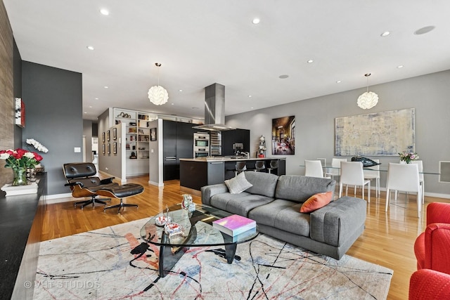 1711 W Division St Unit 303, Chicago, IL 60622 - living area featuring light wood-style floors and recessed lighting