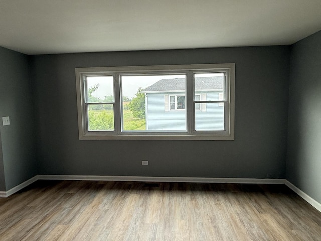 907 Gael Dr Unit D, Joliet, IL 60435 - spare room featuring wood finished floors