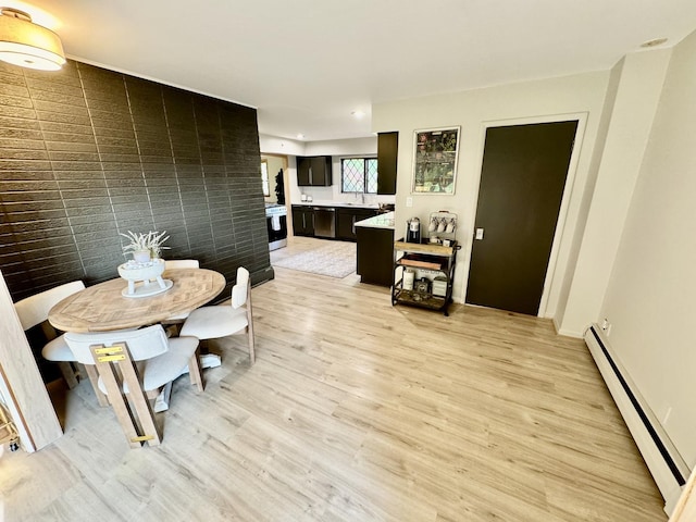 221 Thornbrook Rd, Dekalb, IL 60115 - dining area with a baseboard heating unit, light wood-type flooring, and recessed lighting