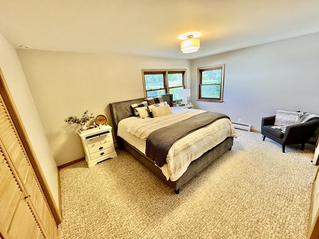 221 Thornbrook Rd, Dekalb, IL 60115 - bedroom featuring light colored carpet and baseboard heating