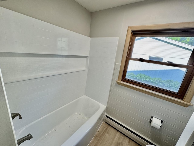 221 Thornbrook Rd, Dekalb, IL 60115 - full bathroom featuring wood finished floors, healthy amount of natural light, tub / shower combination, and a baseboard heating unit