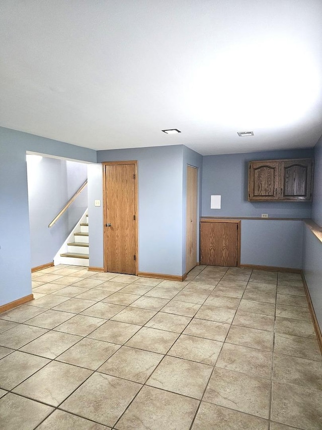6512 Ridge Dr, Chicago Ridge, IL 60415 - spare room featuring stairs and light tile patterned floors
