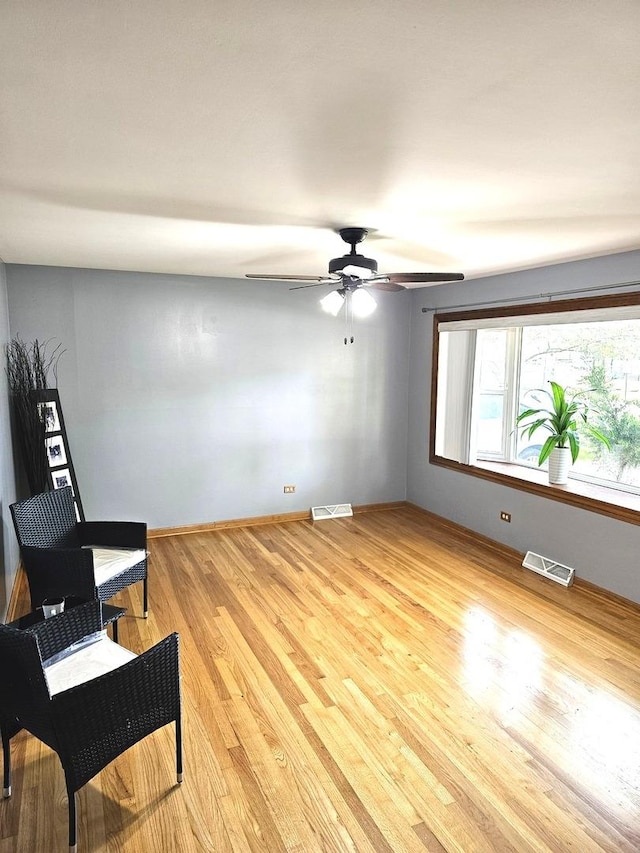 6512 Ridge Dr, Chicago Ridge, IL 60415 - unfurnished room with light wood-style flooring and ceiling fan