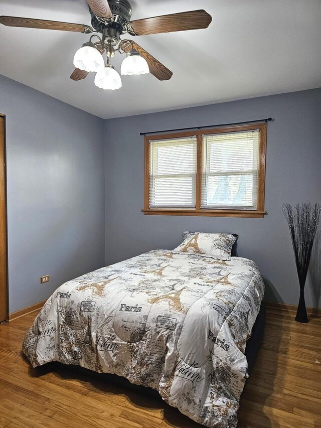 6512 Ridge Dr, Chicago Ridge, IL 60415 - bedroom with wood finished floors and ceiling fan