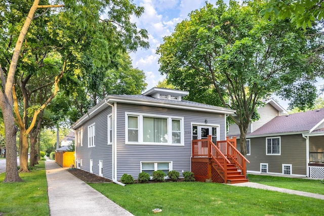 2159 N Nordica Ave, Chicago, IL 60707 - bungalow-style home with a front lawn and stairs