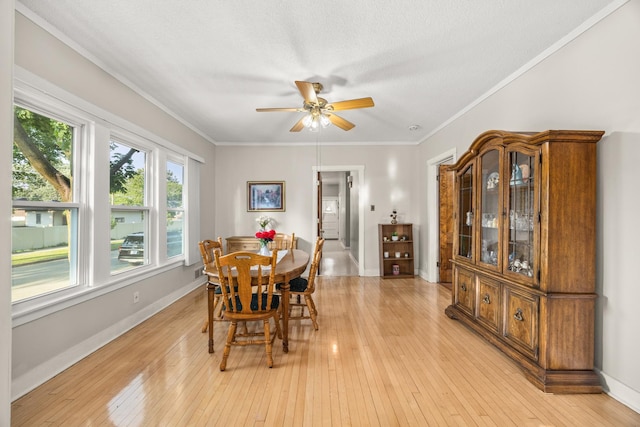 2159 N Nordica Ave, Chicago, IL 60707 - dining area with ceiling fan, light wood-style flooring, and ornamental molding