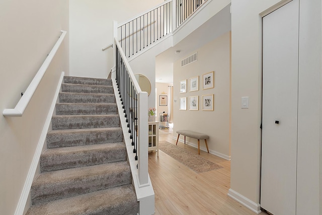 1526 Peachtree Ln, Lockport, IL 60441 - stairs featuring wood finished floors and a towering ceiling