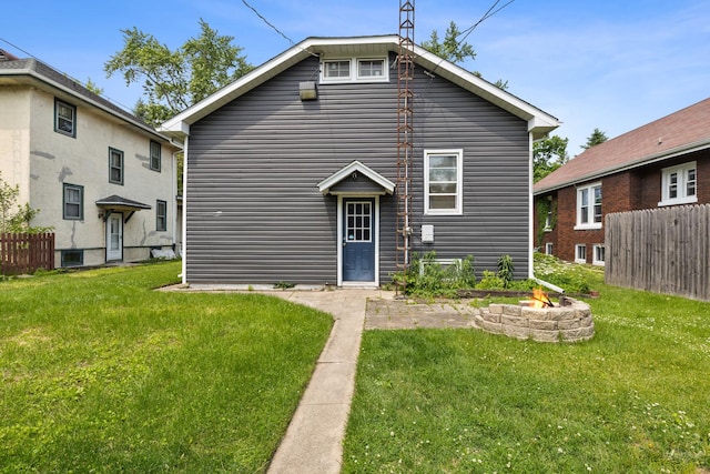 956 S Elm Ave, Kankakee, IL 60901 - back of house with an outdoor fire pit