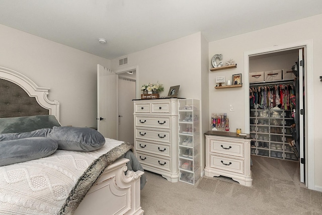 1602 Peachtree Ln, Lockport, IL 60441 - bedroom featuring a walk in closet, a closet, and light carpet