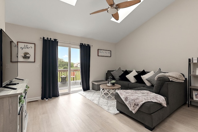 1602 Peachtree Ln, Lockport, IL 60441 - living room with ceiling fan, light wood-style flooring, a skylight, and lofted ceiling