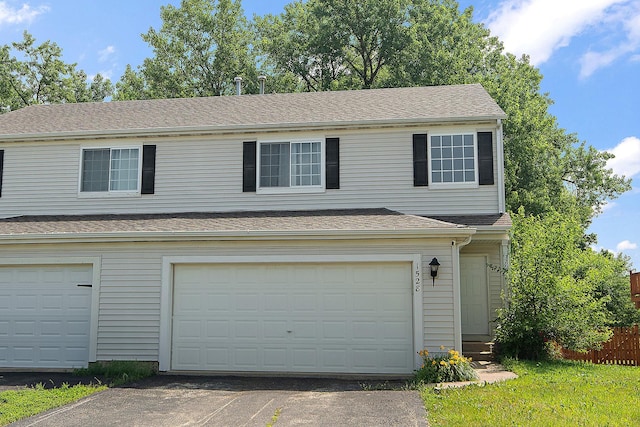 1528 Peachtree Ln, Lockport, IL 60441 - view of front of house featuring an attached garage, driveway, and roof with shingles