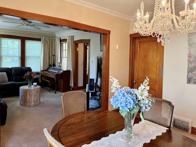 98 Northgate Rd, Riverside, IL 60546 - dining space featuring ornamental molding, ceiling fan, plenty of natural light, a chandelier, and carpet floors