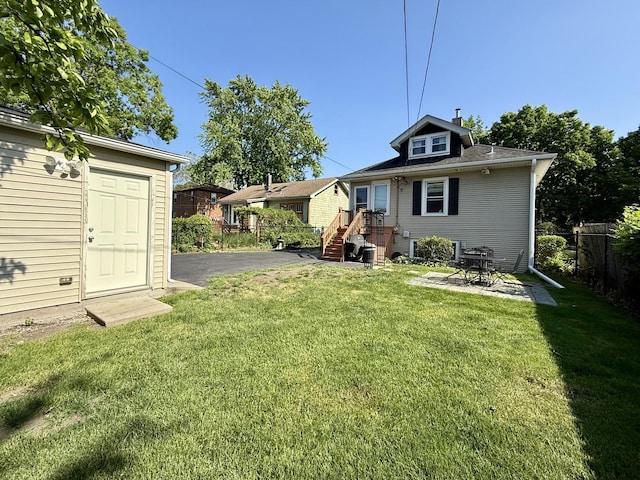 98 Northgate Rd, Riverside, IL 60546 - rear view of house with a patio area and a chimney
