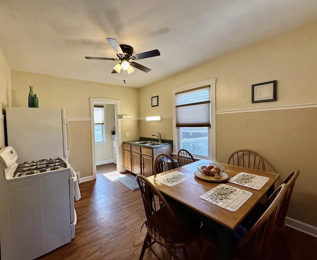 98 Northgate Rd, Riverside, IL 60546 - dining room with a ceiling fan and dark wood-type flooring