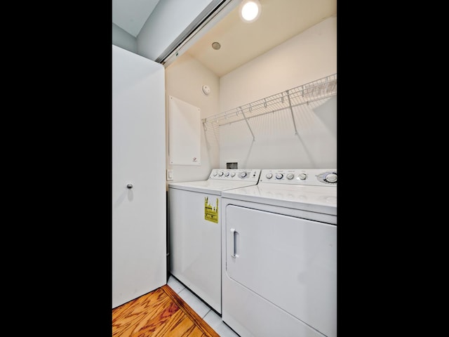 737 W Washington Blvd Unit 3003, Chicago, IL 60661 - laundry area with washer and clothes dryer and light wood-type flooring