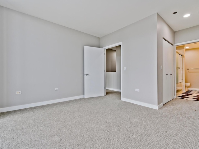737 W Washington Blvd Unit 3003, Chicago, IL 60661 - unfurnished bedroom with carpet floors, recessed lighting, and ensuite bath