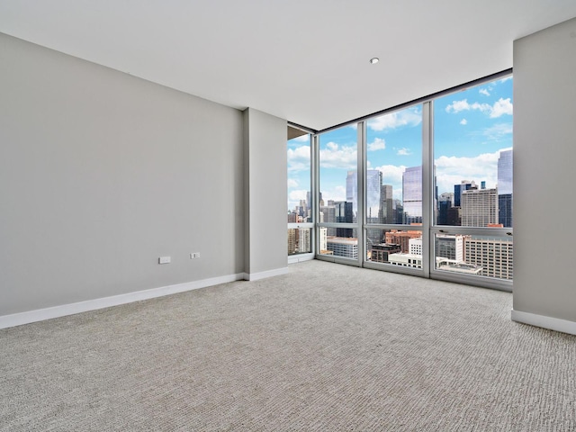 737 W Washington Blvd Unit 3003, Chicago, IL 60661 - carpeted spare room with a wall of windows and a skyline view