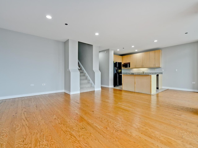737 W Washington Blvd Unit 3003, Chicago, IL 60661 - unfurnished living room with stairway, recessed lighting, and light wood-type flooring