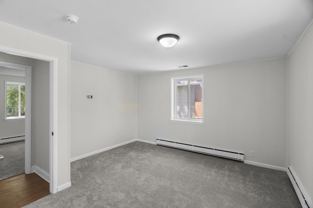 930 S Chatham Ave, Addison, IL 60101 - carpeted spare room featuring a baseboard radiator, a baseboard heating unit, and a smoke detector