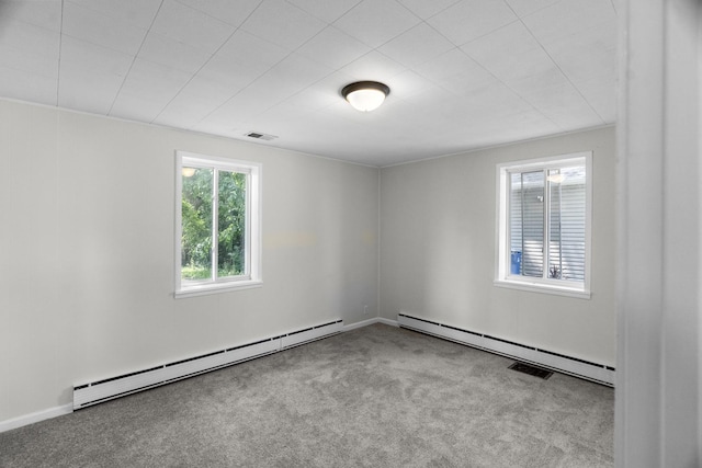 930 S Chatham Ave, Addison, IL 60101 - spare room with a baseboard radiator and carpet flooring