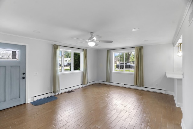930 S Chatham Ave, Addison, IL 60101 - foyer entrance with plenty of natural light, ceiling fan, crown molding, and wood finished floors