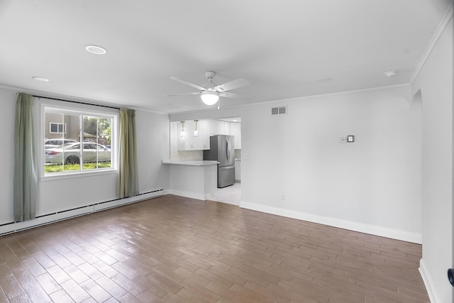 930 S Chatham Ave, Addison, IL 60101 - unfurnished living room with baseboard heating, a ceiling fan, wood finished floors, and crown molding
