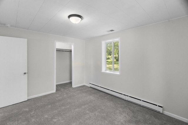 930 S Chatham Ave, Addison, IL 60101 - unfurnished bedroom featuring baseboard heating, carpet floors, and a closet