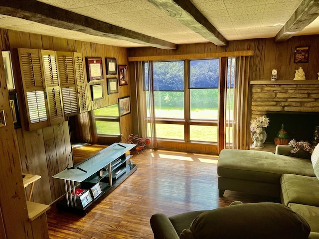 336 Flossmoor Ave, Waukegan, IL 60085 - living room with wooden walls, beam ceiling, and wood finished floors