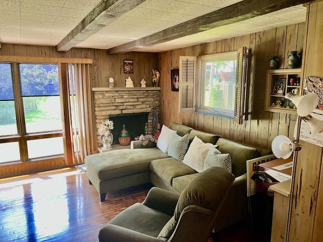 336 Flossmoor Ave, Waukegan, IL 60085 - living area featuring wood walls, beamed ceiling, wood finished floors, and a fireplace