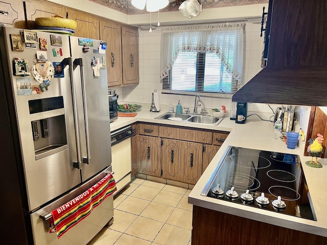 336 Flossmoor Ave, Waukegan, IL 60085 - kitchen with stainless steel refrigerator with ice dispenser, white dishwasher, and light countertops