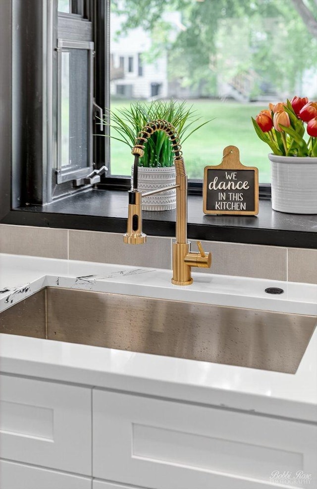111 Mayberry Ct, Rolling Meadows, IL 60008 - kitchen view of a sink and white cabinets