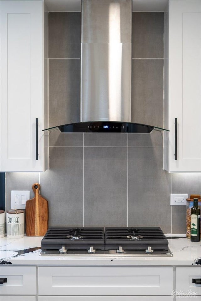 111 Mayberry Ct, Rolling Meadows, IL 60008 - kitchen featuring wall chimney exhaust hood, white cabinetry, and decorative backsplash