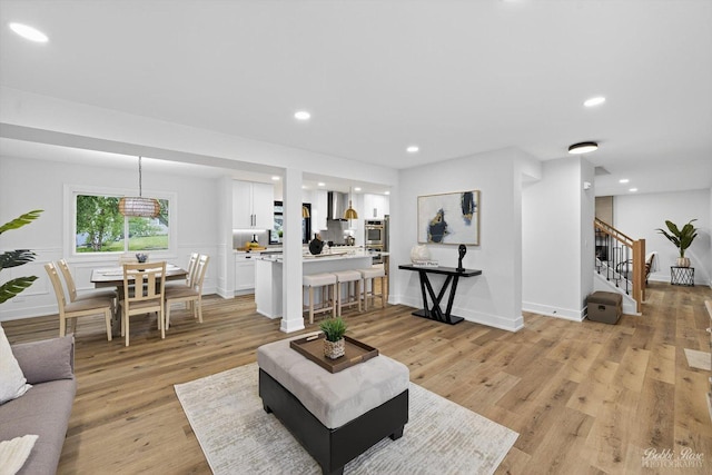 111 Mayberry Ct, Rolling Meadows, IL 60008 - living room featuring stairway, light wood-style floors, and recessed lighting