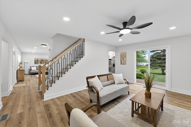 111 Mayberry Ct, Rolling Meadows, IL 60008 - living area with stairs, light wood-style flooring, a ceiling fan, and recessed lighting