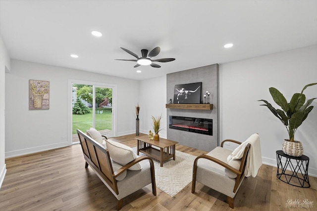 111 Mayberry Ct, Rolling Meadows, IL 60008 - living area featuring a large fireplace, recessed lighting, ceiling fan, and wood finished floors
