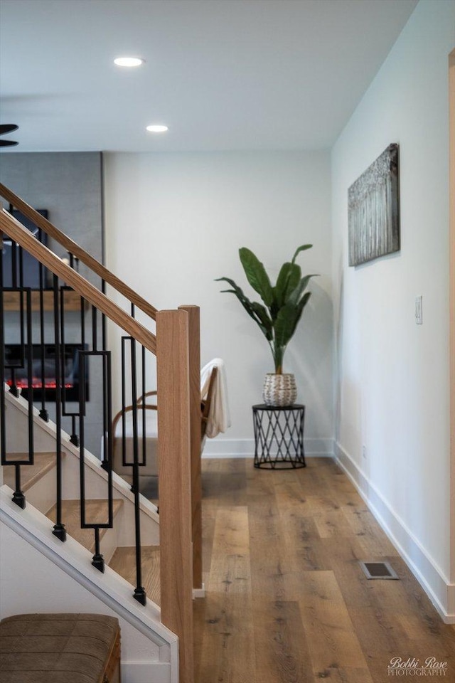 111 Mayberry Ct, Rolling Meadows, IL 60008 - stairway with recessed lighting, wood finished floors, and a ceiling fan