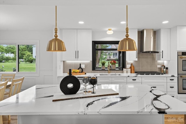 111 Mayberry Ct, Rolling Meadows, IL 60008 - kitchen with wall chimney range hood, plenty of natural light, white cabinets, and recessed lighting