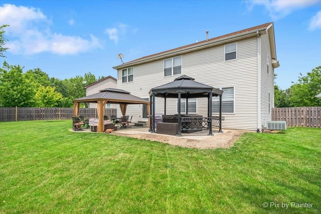 28909 Honeysuckle Ct, Lakemoor, IL 60051 - back of house with a gazebo, a patio area, and a fenced backyard