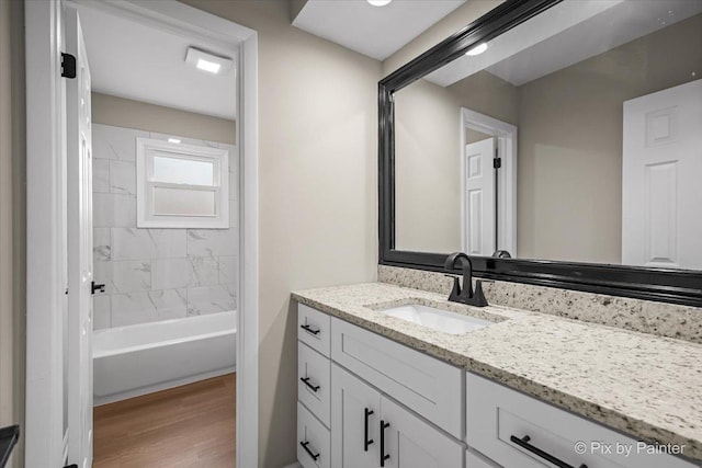 6710 Valley View Rd, Hanover Park, IL 60133 - full bathroom featuring vanity and wood finished floors