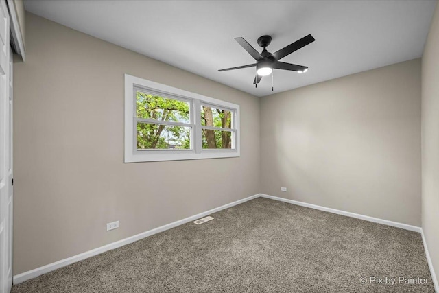 6710 Valley View Rd, Hanover Park, IL 60133 - empty room featuring a ceiling fan and carpet floors