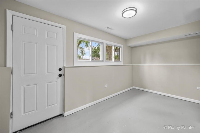 6710 Valley View Rd, Hanover Park, IL 60133 - foyer featuring concrete flooring and baseboards