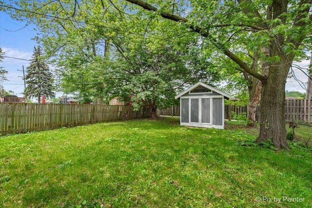 6710 Valley View Rd, Hanover Park, IL 60133 - fenced backyard featuring an outbuilding