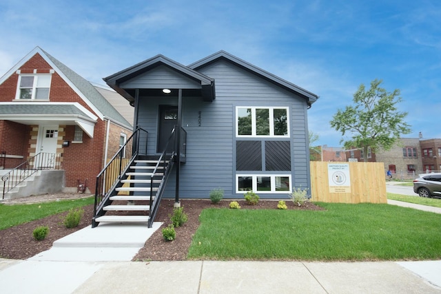 8402 S Carpenter St, Chicago, IL 60620 - view of front of home with a front yard