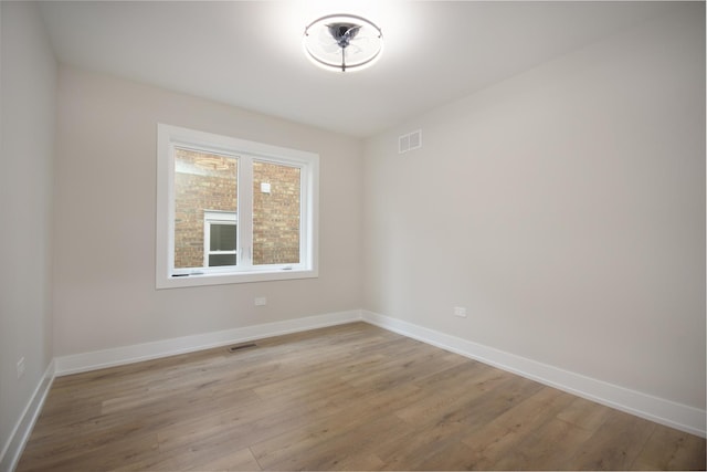 8402 S Carpenter St, Chicago, IL 60620 - spare room with light wood finished floors and baseboards