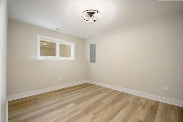 8402 S Carpenter St, Chicago, IL 60620 - spare room with electric panel and light wood finished floors