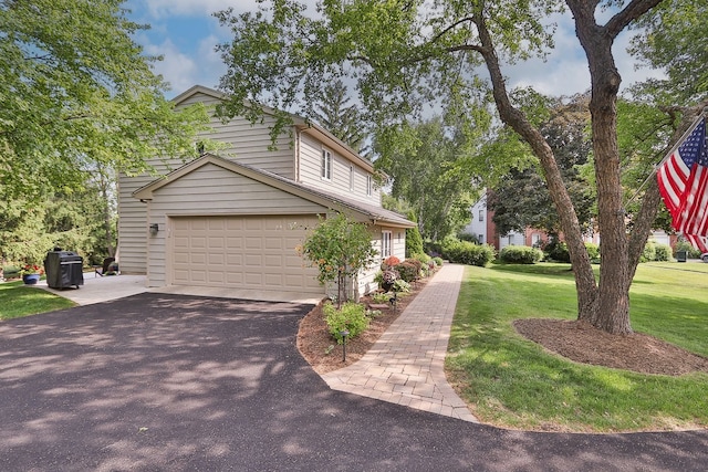 110 Tudor Dr, Barrington, IL 60010 - view of home's exterior featuring asphalt driveway and a lawn