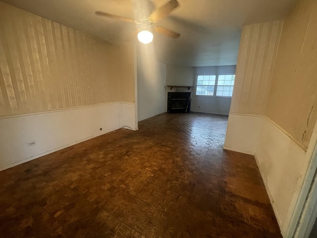 115 Walnut Dr, Streamwood, IL 60107 - unfurnished room featuring a fireplace and ceiling fan