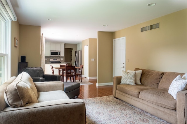 1903 Ronzheimer Ave, Saint Charles, IL 60174 - living room with wood finished floors, plenty of natural light, and recessed lighting