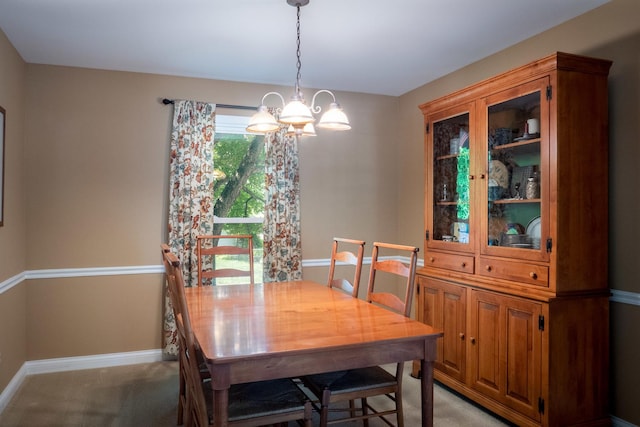 1903 Ronzheimer Ave, Saint Charles, IL 60174 - dining area with a chandelier and light colored carpet